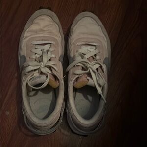 Nike White and Gray Athletic Shoes with Lace-Up Design